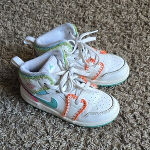 Nike Kids White and Teal Sneakers with Orange Accents